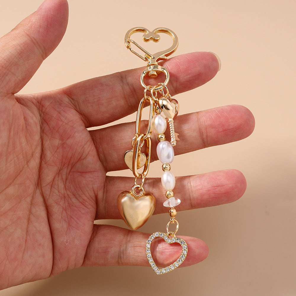 Kreativer Mond XINGX Seestern-Schlüsselanhänger